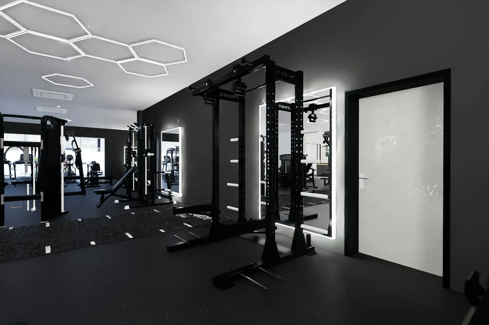 TenTenBodyClub_gym-3_1600 Modern strength training area at TenTenBody Club, a luxury St. Maarten gym featuring Primal Strength equipment and performance-focused design.